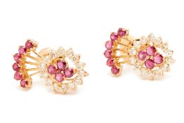 A PAIR OF RUBY AND DIAMOND STUD EARRINGS