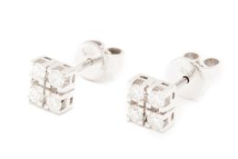 A PAIR OF DIAMOND STUD EARRINGS