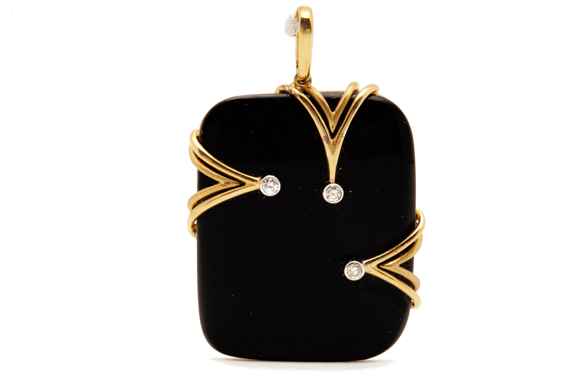 A BLACK ONYX AND DIAMOND PENDANT