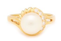 A CULTURED PEARL AND DIAMOND RING