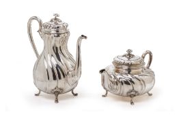 A DANISH SILVER COFFEE POT AND TEAPOT