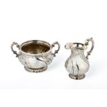 A DANISH SILVER CREAM JUG AND TWIN HANDLED SUGAR BOWL