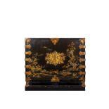 A JAPANESE GILT METAL AND BLACK LACQUER CABINET