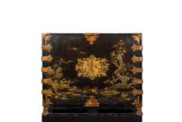 A JAPANESE GILT METAL AND BLACK LACQUER CABINET