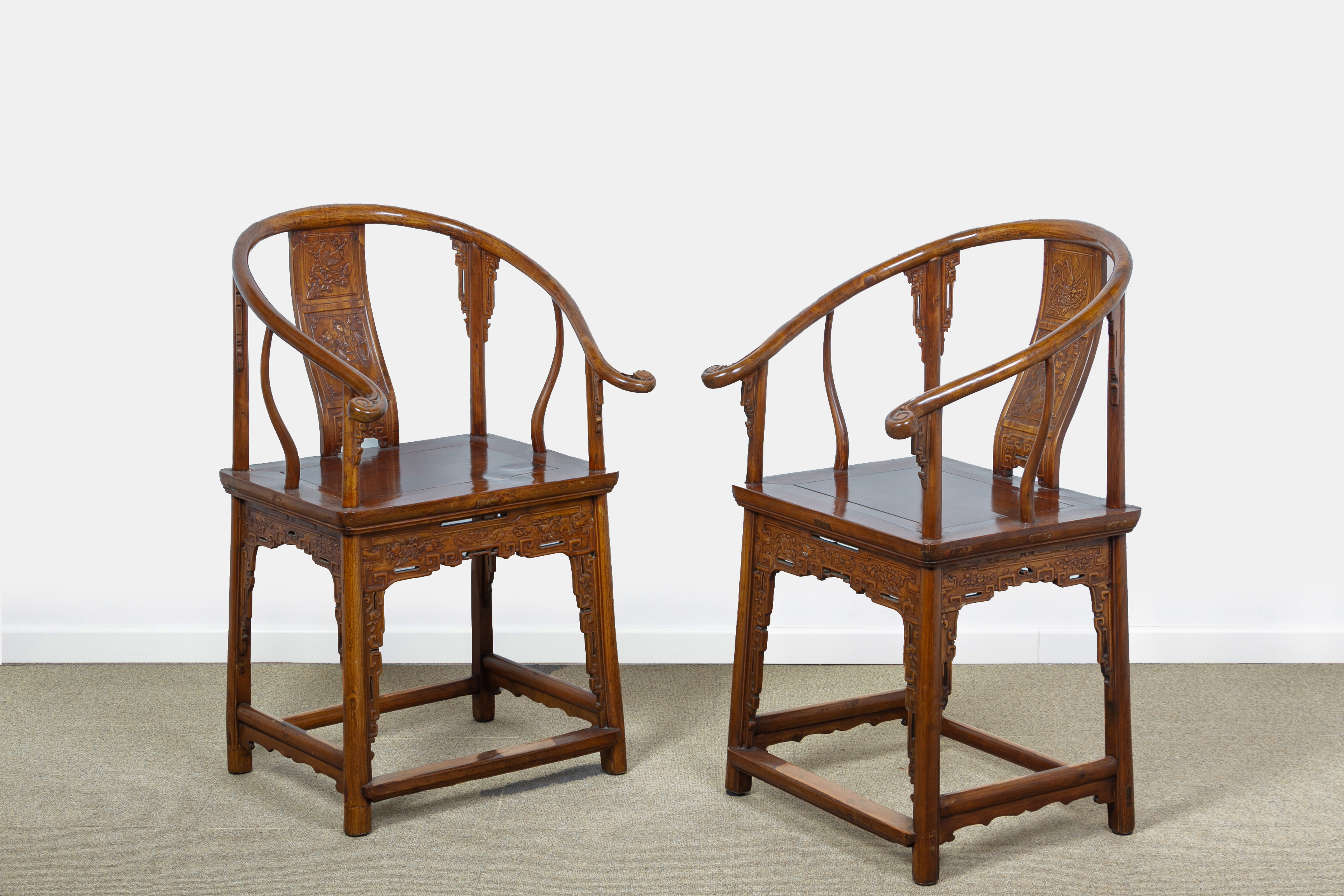 A PAIR OF CHINESE HORSESHOE-BACK ARMCHAIRS