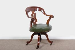A LATE VICTORIAN MAHOGANY AND GREEN LEATHER DESK CHAIR