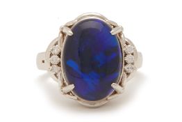 A BLACK OPAL AND DIAMOND RING