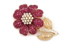 A RUBY AND DIAMOND FLORAL BROOCH