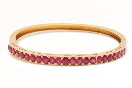 AN UNTREATED RUBY BANGLE