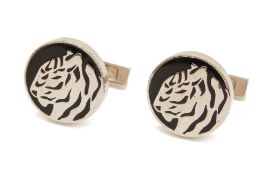 A PAIR OF SILVER AND ENAMEL TIGER CUFFLINKS