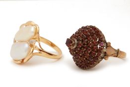 A GARNET COCKTAIL RING AND FRESHWATER PEARL COCKTAIL RING