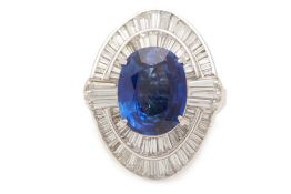 A VIVID BLUE SAPPHIRE AND DIAMOND RING