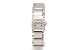 A CARTIER TANKISSIME WHITE GOLD AND DIAMOND BRACELET WATCH