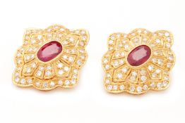 A PAIR OF DIAMOND AND RUBY EARRINGS