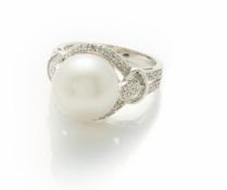 A SOUTH SEA PEARL AND DIAMOND RING