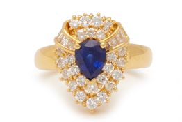 A SAPPHIRE AND DIAMOND RING