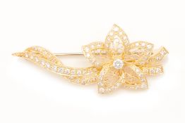 AN ANTIQUE STYLE DIAMOND BROOCH