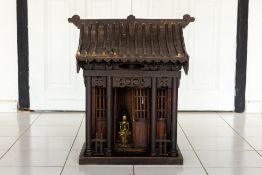 A CHINESE CARVED WOOD PAGODA FORM ALTAR SHRINE