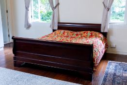 A LARGE SLEIGH BED FRAME