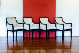 A SET OF FOUR ARMCHAIRS