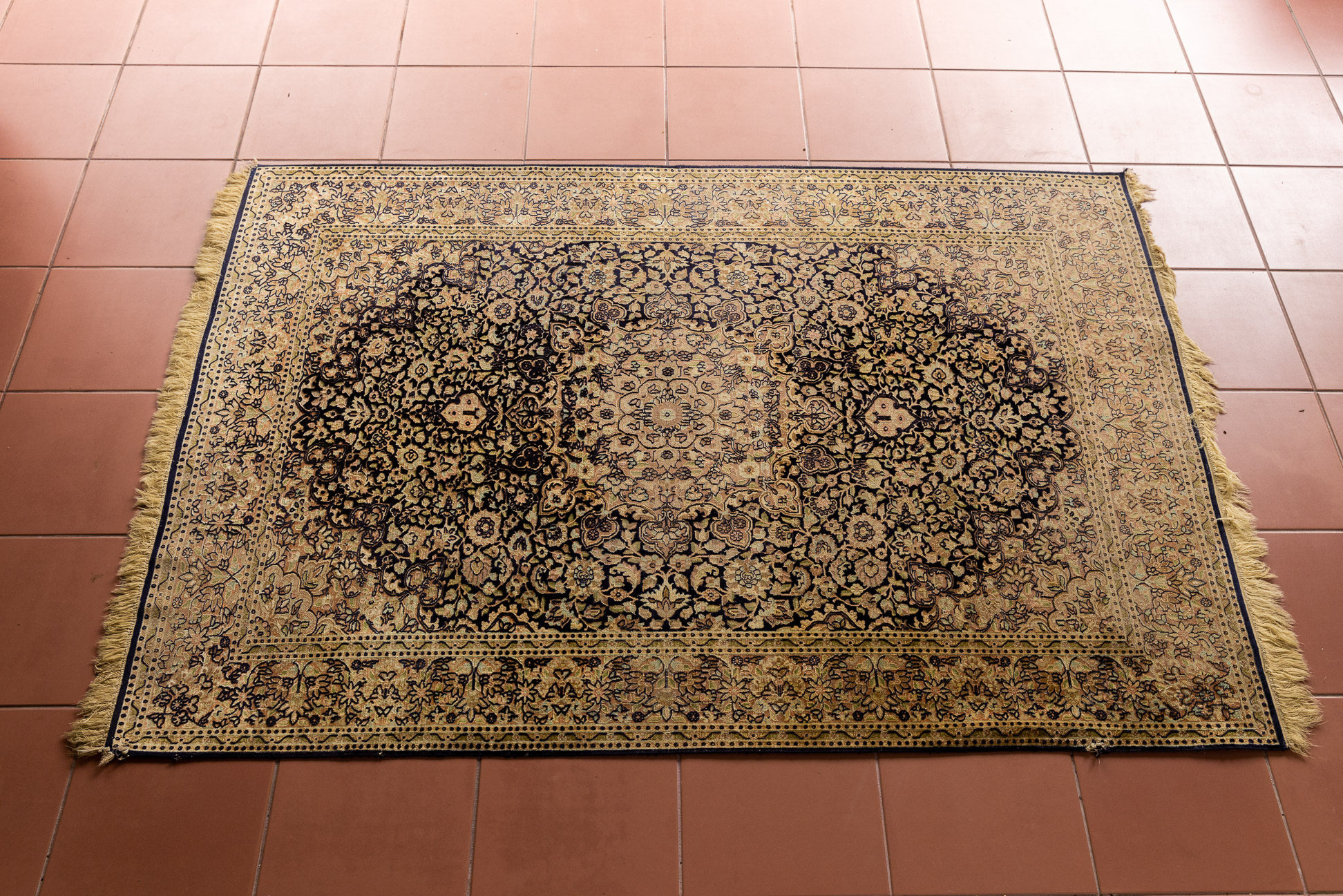 A SILK MEDALLION RUG