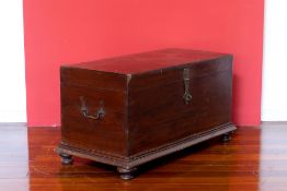 A COLONIAL HARDWOOD TRUNK ON STAND