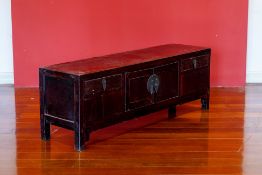 A CHINESE MING STYLE LOW CABINET