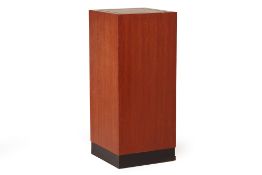 A TALL SQUARE WOOD PLINTH