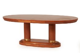 AN ART DECO STYLE EXTENDING DINING TABLE