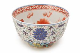 A CHINESE DOUCAI AND IRON RED PORCELAIN LOTUS BOWL