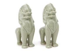 A PAIR OF THAI CELADON GLAZED LIONS