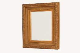 A RECTANGULAR GILT WALL MIRROR