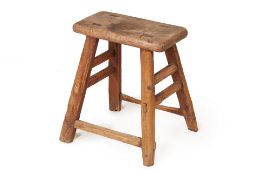 A RUSTIC CHINESE WOOD STOOL