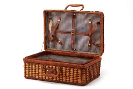 A WICKER PICNIC BASKET