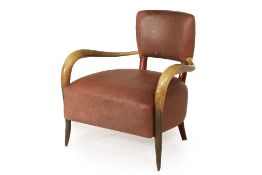 A SIMULATED COW HORN AND LEATHER UPHOLSTERED ARMCHAIR