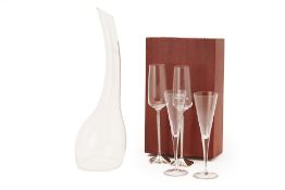 TWO PAIRS OF CHAMPAGNE FLUTES AND A DECANTER