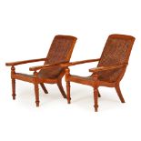 A PAIR OF TEAK PLANTER CHAIRS