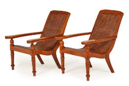 A PAIR OF TEAK PLANTER CHAIRS