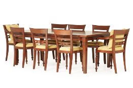 A DINING TABLE AND TEN CHAIRS