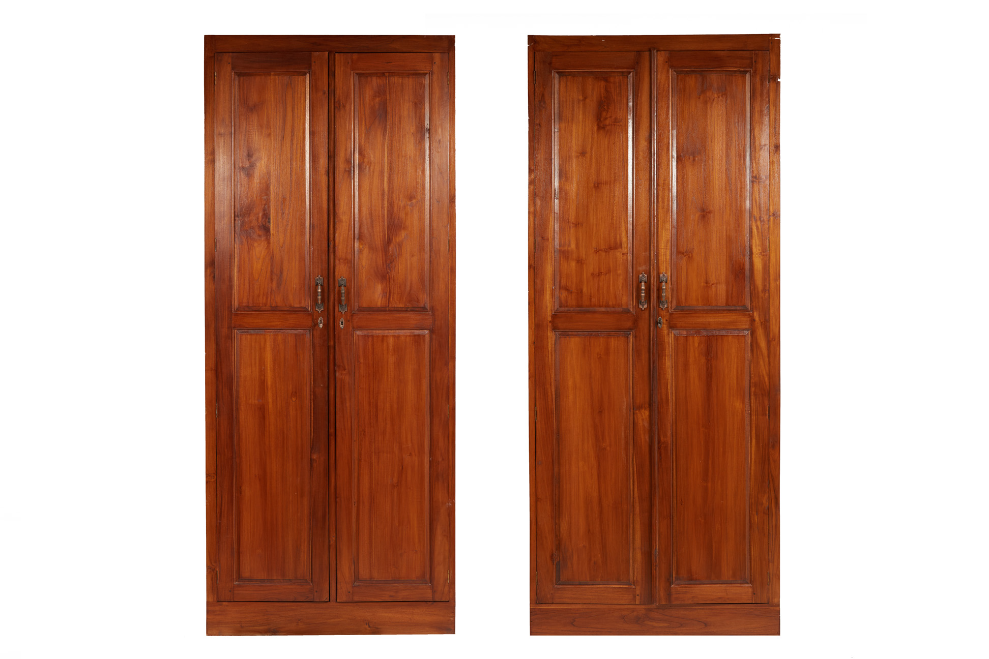 A PAIR OF LARGE PANELLED WARDROBES