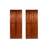 A PAIR OF LARGE PANELLED WARDROBES