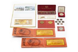A COLLECTION OF COMMEMORATIVE NOTES AND COINS