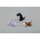 THREE SWAROVSKI 'GANG OF DOG' FIGURINES