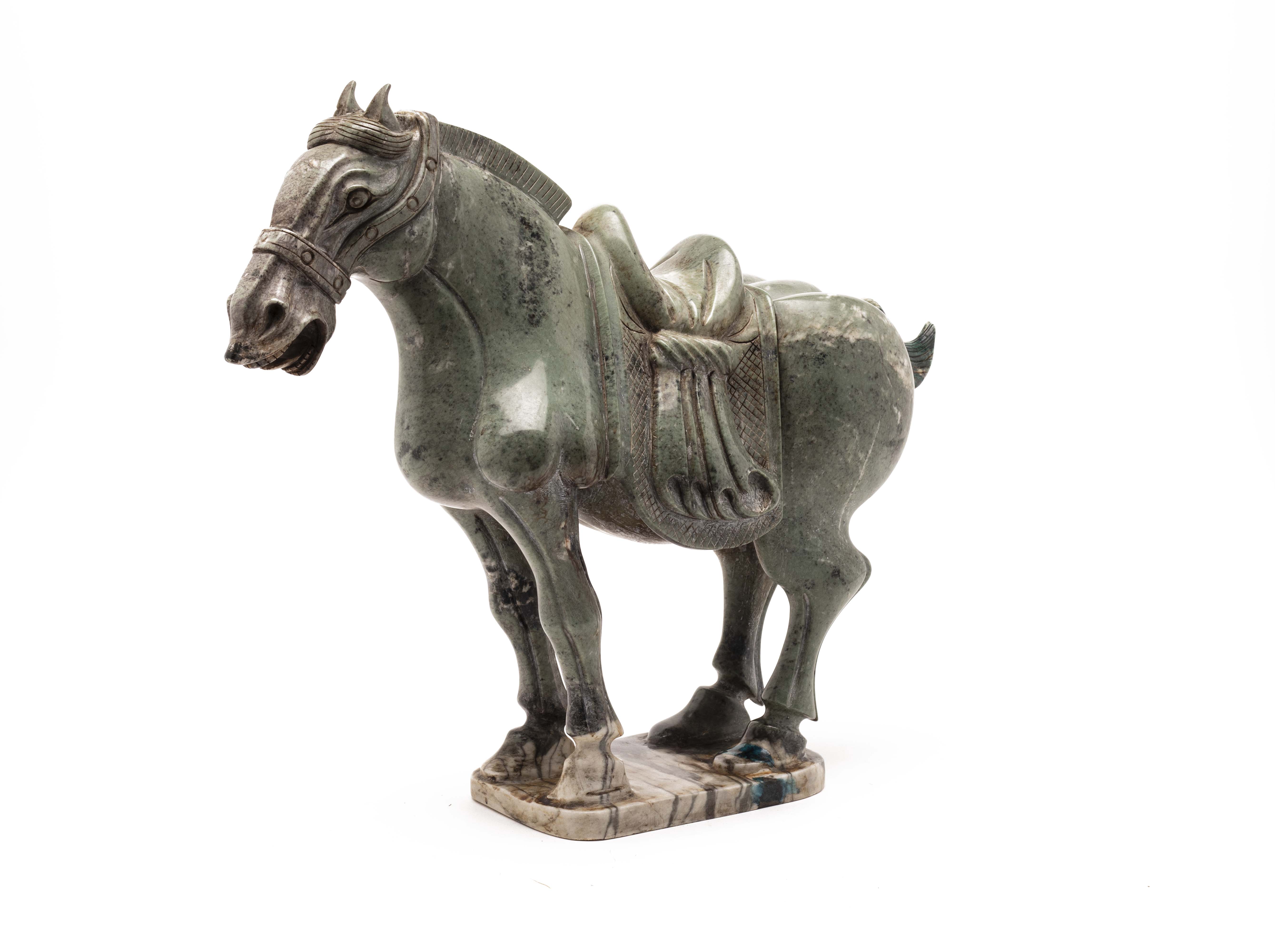 A CARVED HARDSTONE MODEL OF A HORSE