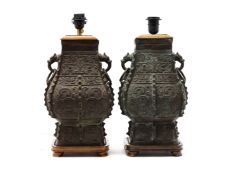 A PAIR OF ARCHAIC CHINESE STYLE TABLE LAMPS