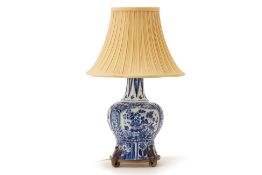 A BLUE AND WHITE VASE MOUNTED AS A TABLE LAMP