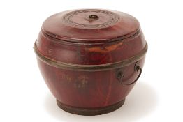 A TWIN HANDLED RED LACQUER CONTAINER