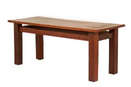 A NARRA & KAMAGONG WOOD DINING TABLE