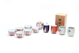 A JAPANESE TEA SERVICE AND CUPS