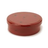 A RED LACQUER CIRCULAR BOX AND COVER
